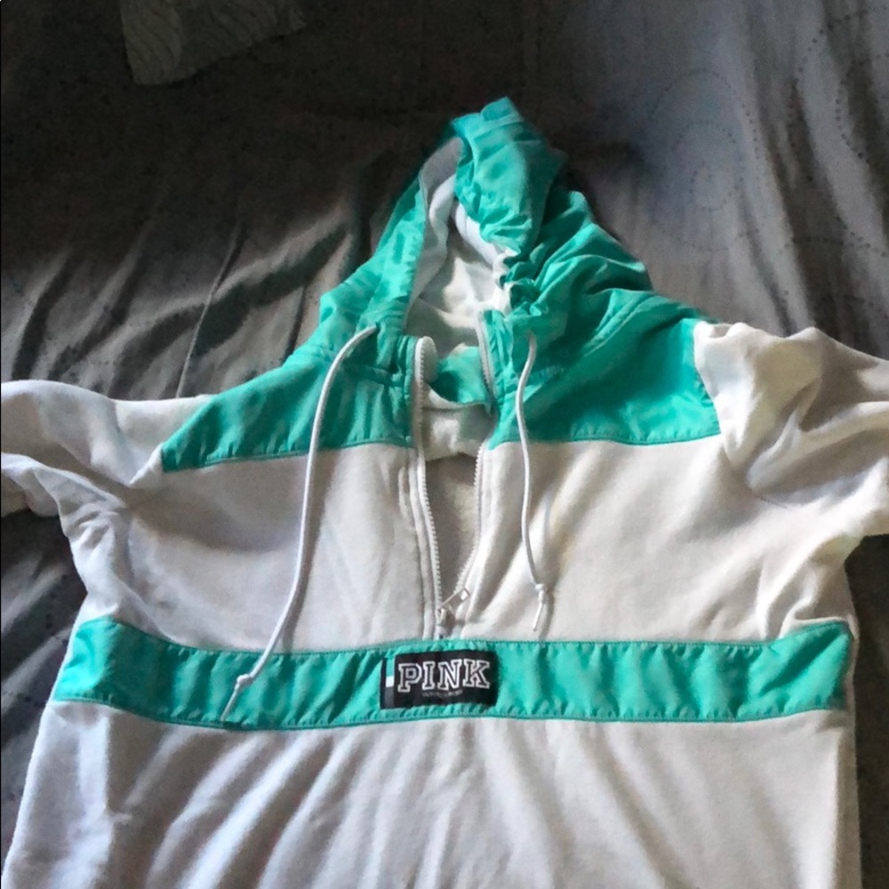 Teal and white sweatshirt from pink
